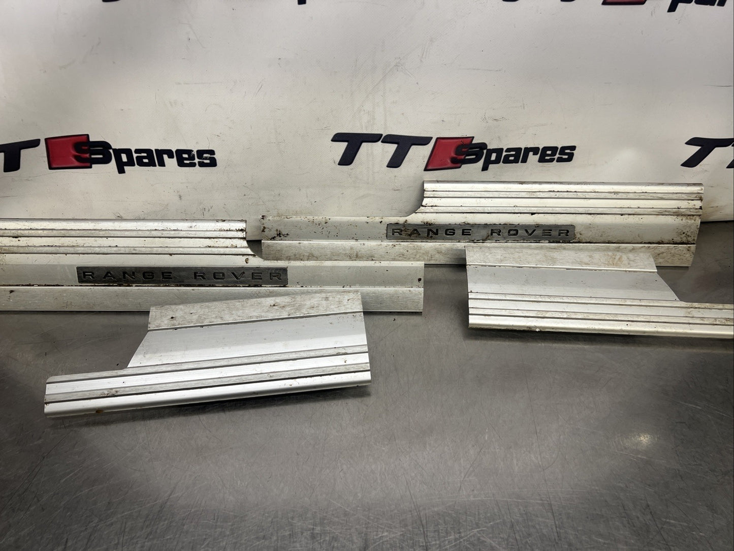 Range Rover L322 Kick Plates Full Set of 4 Aluminium Genuine 2006 to 2013 Lights