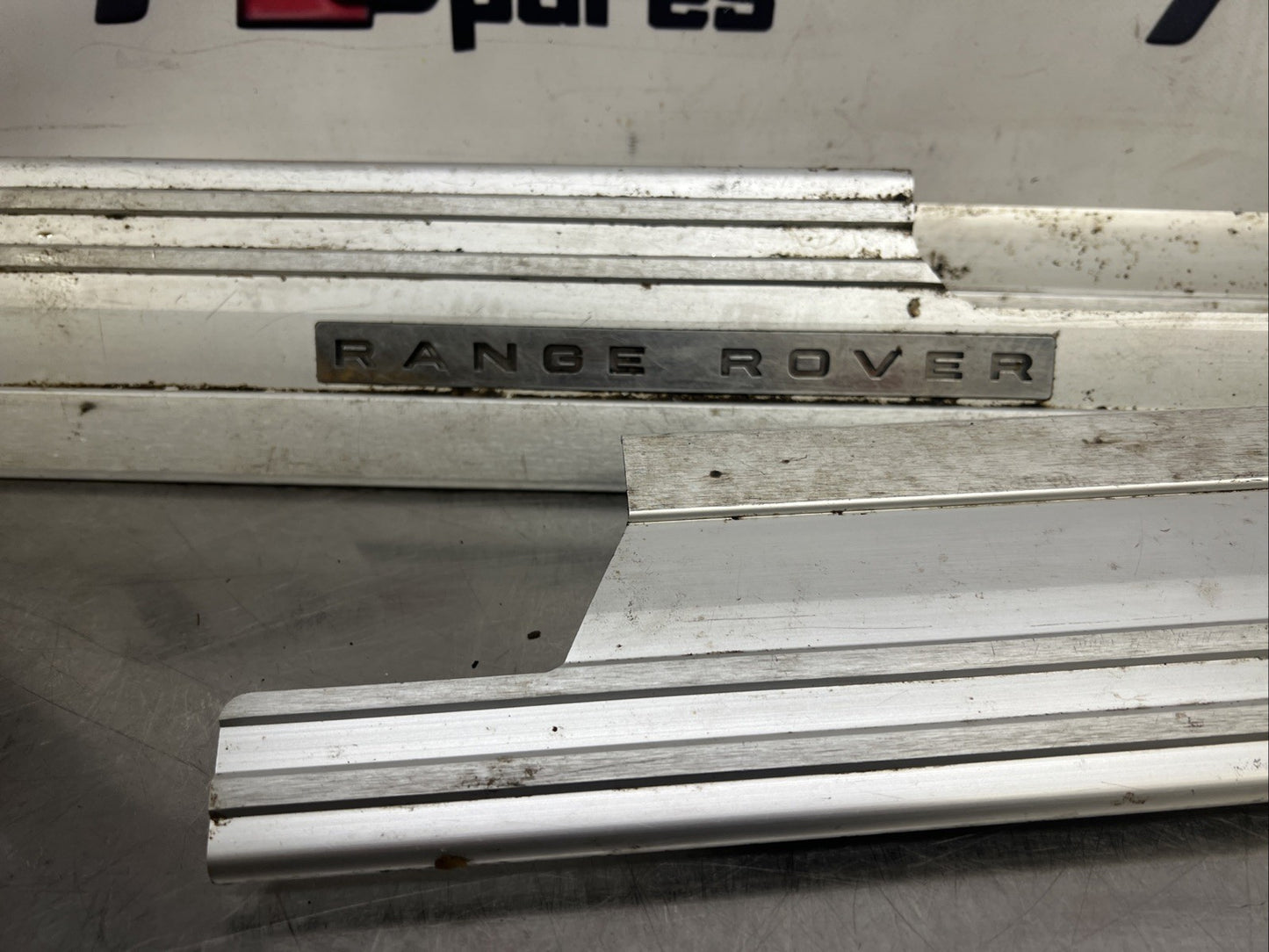 Range Rover L322 Kick Plates Full Set of 4 Aluminium Genuine 2006 to 2013 Lights