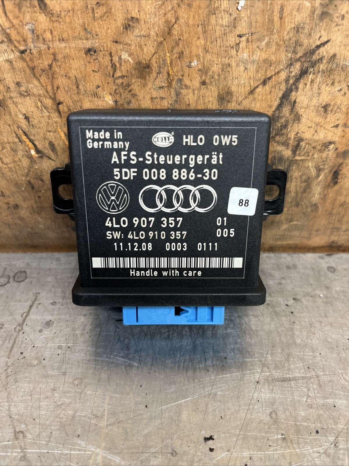 VW AUDI SEAT SKODA HEADLIGHT RANGE CONTROL UNIT  GENUINE 4L0907357